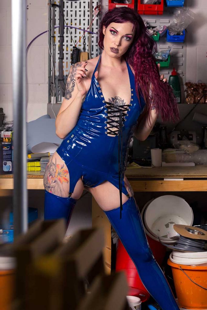 Cici Anders posing in blue latex pic 3 of 12